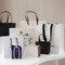 Sacos de compras cosméticos luxuosos feitos sob encomenda da roupa dos sacos de papel com punhos