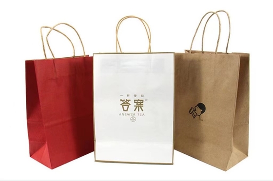 Brown branco 250gsm Kraft imprimiu os sacos de compras de papel com punhos