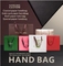Abrazine UV imprimiu os sacos de compras de papel personalizou o saco do presente da promoção