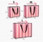 Sacos de papel cosméticos listrados cor-de-rosa de Pantone CMYK para presentes do retorno
