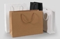 o saco de papel de compra branco Brown do ofício da altura de 17cm a de 44cm ensaca com punhos